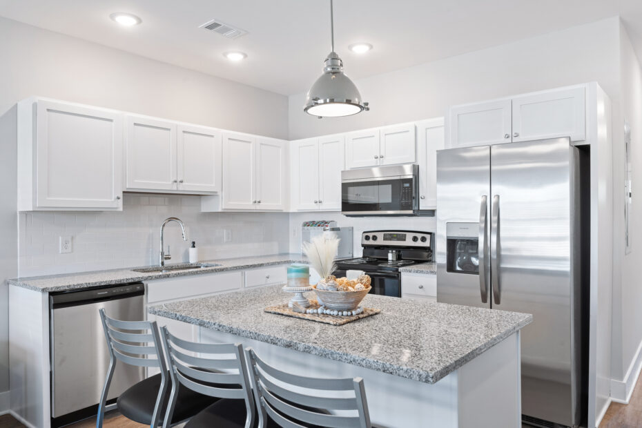 Dining area with stylish seating in a furnished apartment at The Haven at Wake