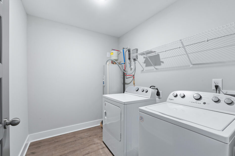 Laundry room with in-unit washer and dryer at The Haven at Wake