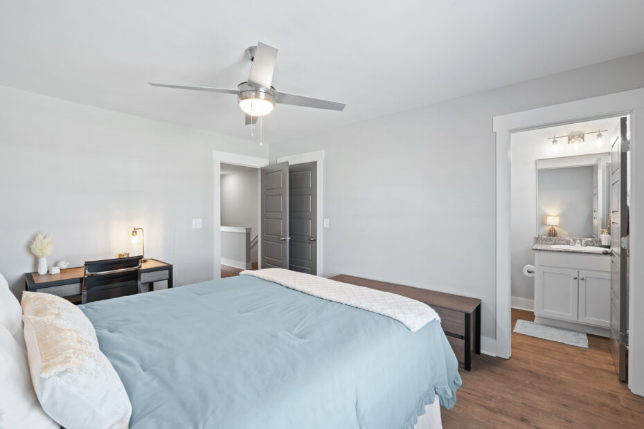 Spacious bedroom with queen-size bed and walk-in closet at The Haven at Wake