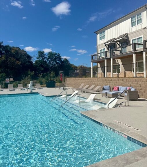 Luxurious pool with tanning beds, games and grill at Haven at Wake