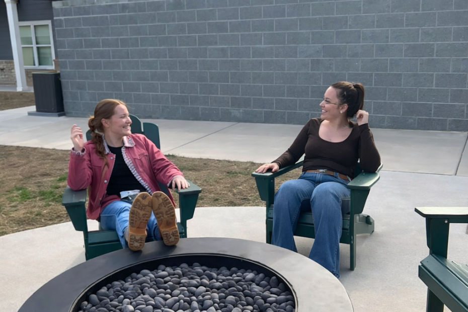 Cozy fire pit and grill station adjacent to the pool and clubhouse at The Haven at Wake.