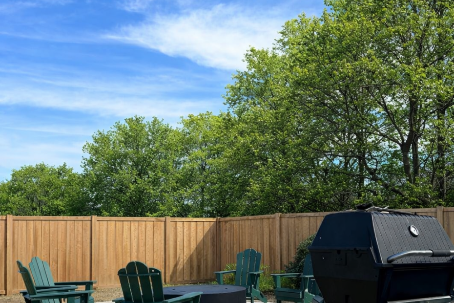 Cozy fire pit and grill station adjacent to the pool and clubhouse at The Haven at Wake.