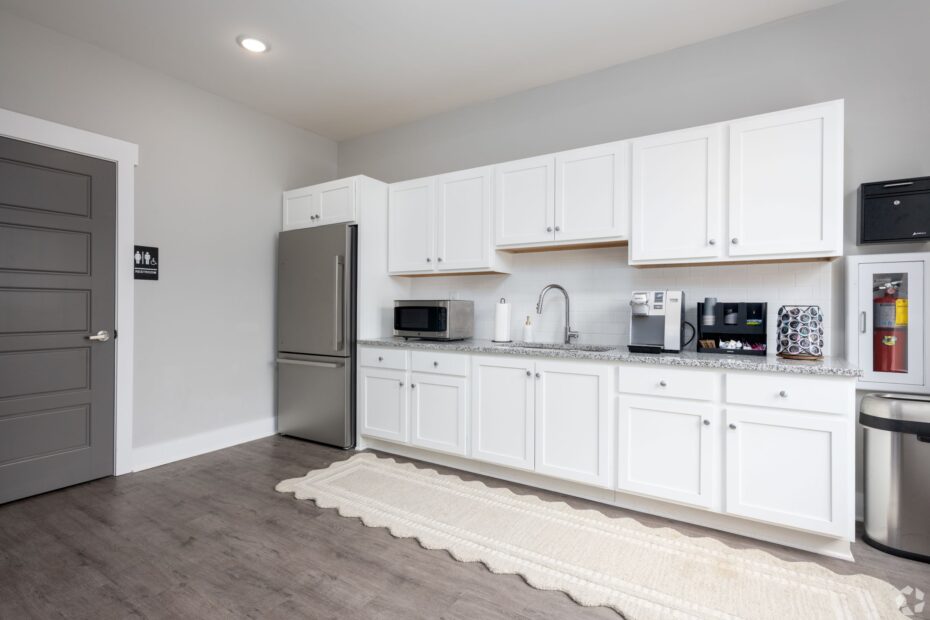 Two-story clubhouse at The Haven at Wake with lounge area, coffee bar & ping pong area.