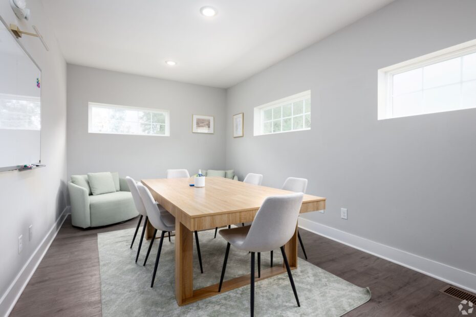 Two-story clubhouse at The Haven at Wake with lounge area, and three study room options with a print station.